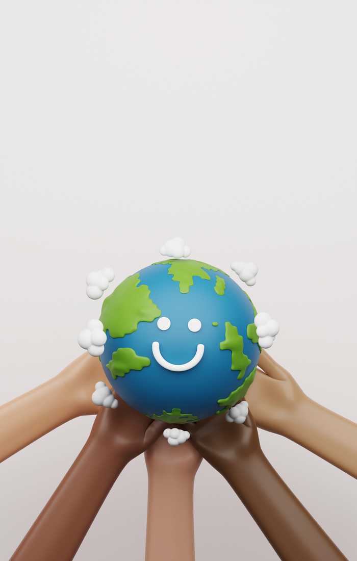 Hands touching earth on blue background.